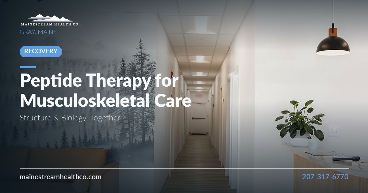 Bright clinic hallway with wood reception desk and a misty pine mural