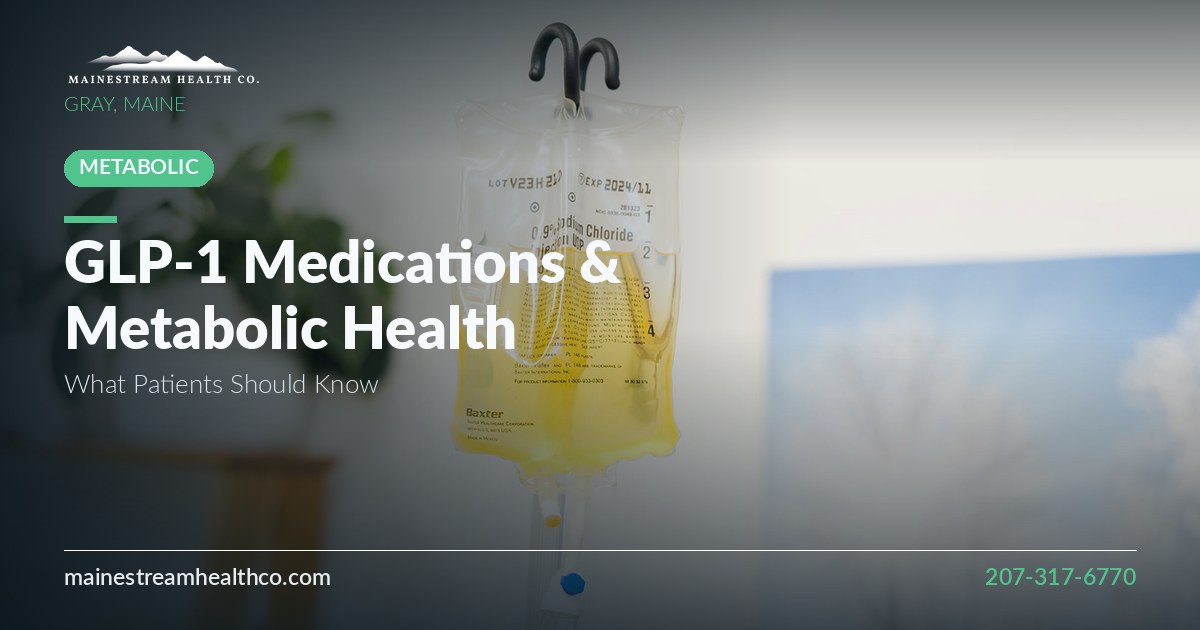 IV therapy bag hanging on a stand in a bright clinical room