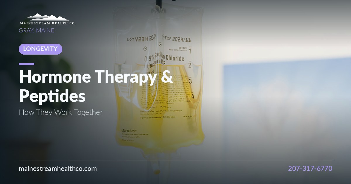 IV therapy bag on a stand beside winter landscape artwork